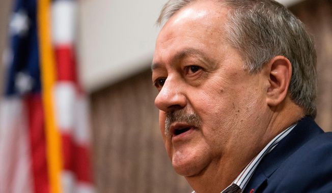 FILE - In this Jan. 18, 2018, file photo, former Massey CEO and West Virginia Republican Senatorial candidate, Don Blankenship, speaks during a town hall to kick off his campaign in Logan, W. Va.  Blankenship has unleashed a political ad that takes swipes at &amp;quot;China people&amp;quot; and calls the Senate majority leader &amp;quot;Cocaine Mitch.&amp;quot;  His ad says McConnell has created jobs for &amp;quot;China people&amp;quot; and charges that his &amp;quot;China family&amp;quot; has given him millions of dollars.McConnell&#x27;s wife is U.S. Transportation Secretary Elaine Chao, whose parents are originally from China.(AP Photo/Steve Helber, File)