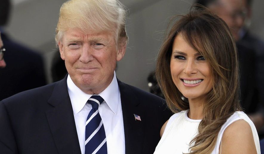 More Americans say they approve of President Trump and first lady Melania Trump. Mr. Trump's rating is 48 percent. Hers is 50 percent. (Associated Press)