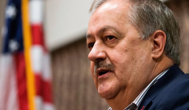 In this Jan. 18, 2018, file photo, former Massey CEO and West Virginia Republican Senatorial candidate, Don Blankenship, speaks during a town hall to kick off his campaign in Logan, W.Va. Blankenship went from prison to politics after serving a one-year sentence related to the deadliest U.S. mine disaster in four decades. His quest: To take down the man he blames for fueling public distrust of him, Democratic U.S. Sen. Joe Manchin of West Virginia. (AP Photo/Steve Helber, File)