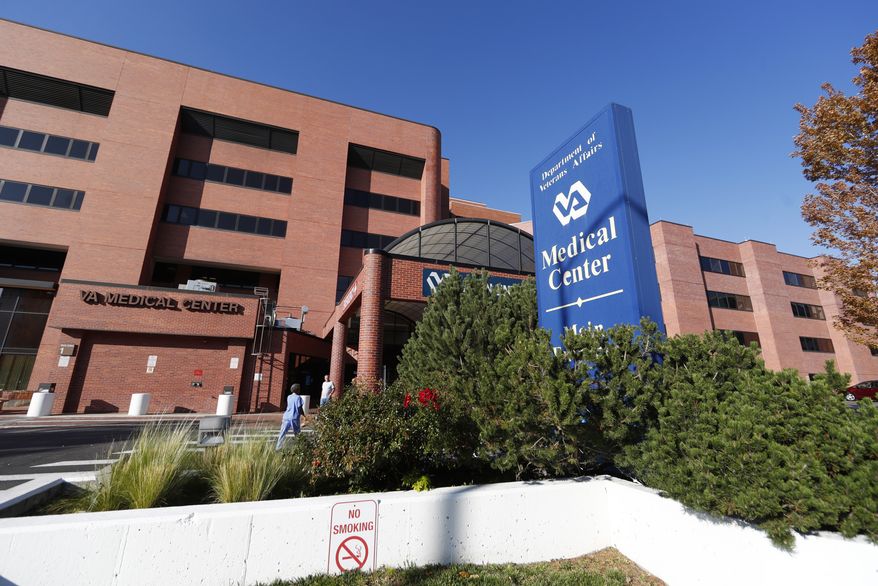 The exterior of the Veterans Affairs Department hospital is shown in east Denver. Investigators with the VA Office of Inspector General found that the hospital violated policy by keeping improper wait lists to track veterans' mental health care, confirming a whistleblower’s claims. (AP Photo/David Zalubowski, File)