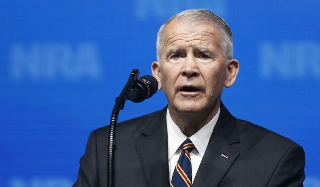 In this May 4, 2018, photo, former U.S. Marine Lt. Col. Oliver North speaks before giving the Invocation at the National Rifle Association-Institute for Legislative Action Leadership Forum in Dallas. (AP Photo/Sue Ogrocki) ** FILE **