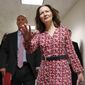 CIA Director nominee Gina Haspel, waves as she arrives for her meeting with Sen. Joe Manchin, D-W.Va., on Capitol Hill in Washington, Monday, May 7, 2018. Walking with her is White House legislative affairs director Marc Short, left. (AP Photo/Pablo Martinez Monsivais)