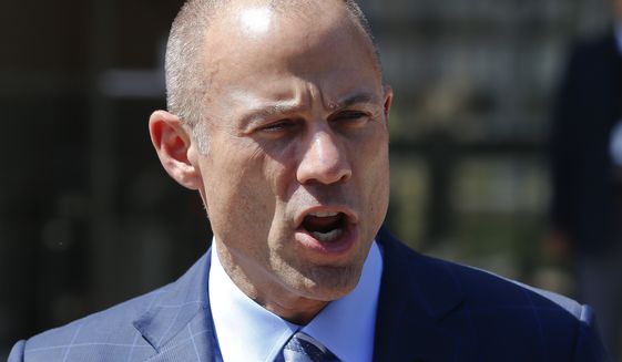 Michael Avenatti, attorney for Stormy Daniels, talks to the media outside court in Los Angeles Friday, April 20, 2018. A federal judge told lawyers for President Donald Trump's attorney Michael Cohen that Cohen needs to file a declaration in court in order to delay a lawsuit filed by porn actress Stormy Daniels aimed at dissolving a confidentiality agreement that prevents her from talking about an alleged affair with Trump. (AP Photo/Damian Dovarganes)