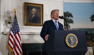 President Donald Trump delivers a statement on the Iran nuclear deal from the Diplomatic Reception Room of the White House, Tuesday, May 8, 2018, in Washington. (AP Photo/Evan Vucci)