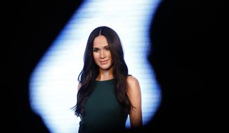 Britain&#39;s Prince Harry&#39;s fiancee Meghan Markle is on display as wax figure at Madame Tussauds in London, Wednesday, May 9, 2018. As the world eyes are on the upcoming royal wedding, Madame Tussauds London unveils Meghan Markle&#39;s figure. (AP Photo/Frank Augstein)