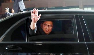 In this April 27, 2018, file photo, North Korean leader Kim Jong-un waves from a car as he returns to North Korea after the meeting with South Korean President Moon Jae-in at the border village of Panmunjom in the Demilitarized Zone, South Korea. (Korea Summit Press Pool via AP, File)