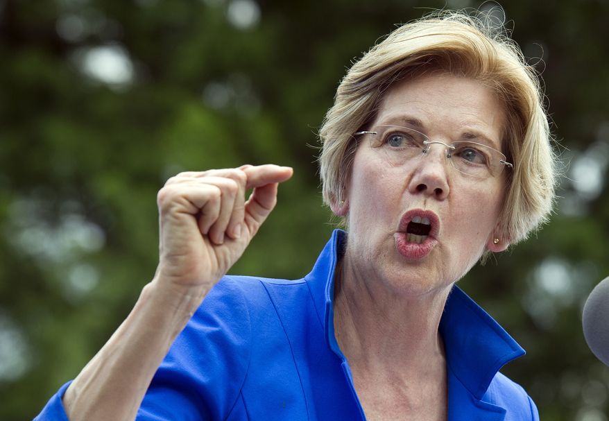 Sen. Elizabeth Warren, Massachusetts Democrat, speaks in a park in Berryville, Va., where Congressional Democrats unveiled their new agenda, on July 24, 2017. (Associated Press) **FILE**