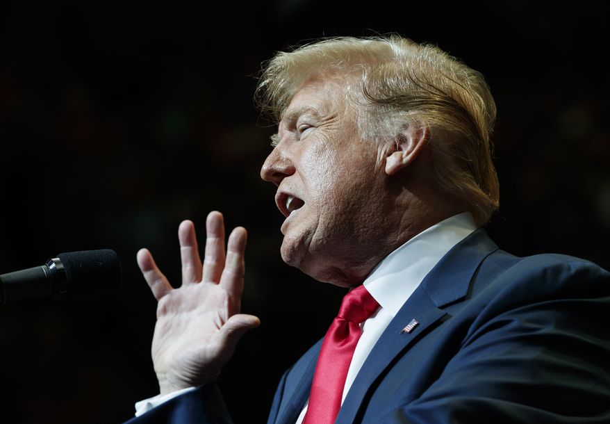 U.S. President Donald Trump speaks at the North Side Gymnasium in Elkhart, Ind., Thursday, May 10, 2018, during a campaign rally. (AP Photo/Carolyn Kaster)