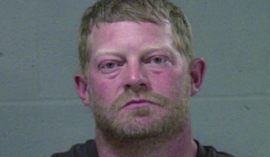 In this photo provided by the Oklahoma County Sheriff's Office, Jeffrey Don Edwards is pictured in a booking photo dated May 9, 2018. Edwards faces animal cruelty charges after his teenage daughter accused him of killing her two dogs to punish her for not doing the dishes. (Oklahoma County Sheriff's Office via AP)