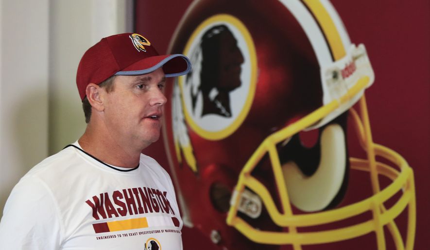 Redskins head coach Jay Gruden, walks to the podium at the start of a news conference at NFL football team&#39;s rookie minicamp at the Redskins Park in Ashburn, Va., Friday, May 11, 2018.(AP Photo/Manuel Balce Ceneta)