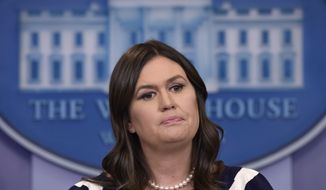 White House press secretary Sarah Huckabee Sanders listens to a reporter&#x27;s question during the daily briefing at the White House in Washington, Friday, May 11, 2018. (AP Photo/Susan Walsh)