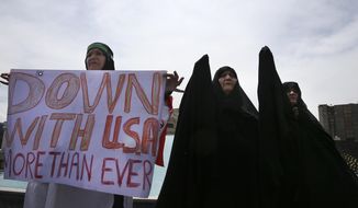 Iranian women attend an anti-U.S. gathering after the Friday prayer in Tehran, Iran, Friday, May 11, 2018. Thousands of Iranians took to the streets in cities across the country to protest U.S. President Donald Trump&#39;s decision to pull out of the nuclear deal with world powers. (AP Photo/Vahid Salemi)