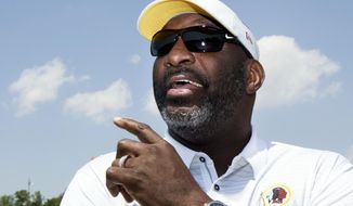 Washington Redskins Senior Vice President of Player Personnel Doug Williams watches during the NFL football team&#39;s rookie minicamp at the Redskins Park in Ashburn, Va., Friday, May 11, 2018. Williams&#39; connection to Grambling and other Historically Black Colleges and Universities could be a boon for the Redskins in finding another source of talent. (AP Photo/Manuel Balce Ceneta)