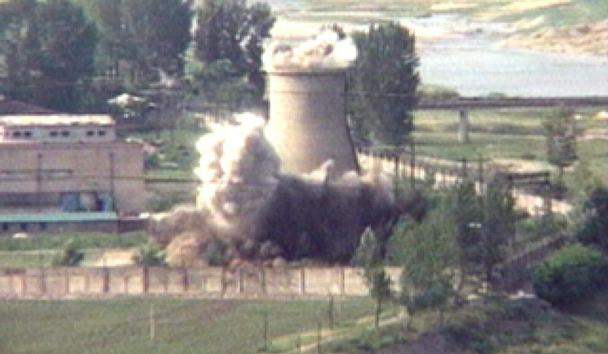 In this June 27, 2008, file image from TV,  the demolition of the 60-foot-tall cooling tower at its main reactor complex in Yongbyon North Korea. North Korea&#x27;s Foreign Ministry said Saturday May 12, 2018, it will hold a &amp;quot;ceremony&amp;quot; for the dismantling of its nuclear test site on May 23-25 in what would be a dramatic but symbolic event to set up the summit meeting between Kim Jong-un and U.S. President Donald Trump scheduled for next month. (AP Photo/APTN, File)