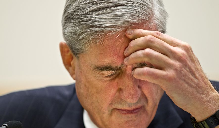 FBI Director Robert Mueller testifies on Capitol Hill in Washington, Wednesday, May 9, 2012, before the House Judiciary Committee.  (AP Photo/J. Scott Applewhite)