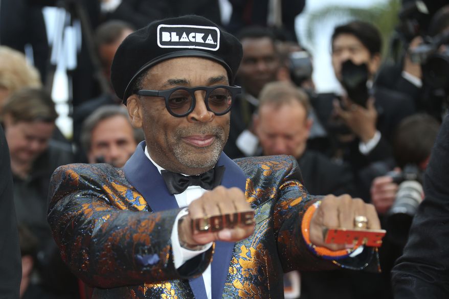 Director Spike Lee poses for photographers upon arrival at the premiere of the film &#39;BlacKkKlansman&#39; at the 71st international film festival, Cannes, southern France, Monday, May 14, 2018. (Photo by Joel C Ryan/Invision/AP)