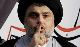 Shiite cleric Muqtada al-Sadr gives a speech to his followers on March, 27, 2016 before entering the highly fortified Green Zone, in Baghdad, Iraq. Al-Sadr, who led punishing attacks on American forces after the 2003 U.S.-led overthrow of Saddam Hussein, appears set to secure the most significant victory of his political career with a strong showing in the May 12 parliamentary election. Al-Sadr gained popularity as a nationalist voice campaigning against corruption and against Irans influence in the country. (AP Photo/Karim Kadim, File)