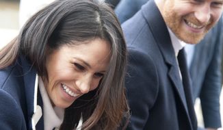 FILE - In this file photo dated Thursday March 8, 2018, Britain&#39;s Prince Harry and his fiancee Meghan Markle arrive for an event for young women, as part of International Women&#39;s Day in Birmingham, central England. Kensington Palace said Monday May 14, 2018, that Britain’s Prince Harry and Meghan Markle are requesting “understanding and respect” for Markle’s father after a celebrity news site reported he would not be coming to the royal wedding to walk his daughter down the aisle. (AP Photo/Rui Vieira, FILE)