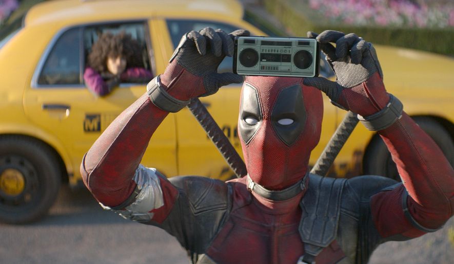This image released by Twentieth Century Fox shows Ryan Reynolds in a scene from "Deadpool 2." (Twentieth Century Fox via AP)