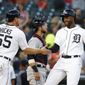 Detroit Tigers&#x27; Niko Goodrum, right, celebrates his two-run home run with teammate John Hicks (55) in the fourth inning of a baseball game against the Cleveland Indians in Detroit, Monday, May 14, 2018. (AP Photo/Paul Sancya)
