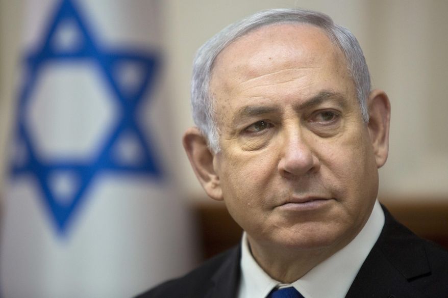 In this April 29, 2018 file photo, Israeli Prime Minister Benjamin Netanyahu arrives for a weekly cabinet meeting at the Prime Minister's office in Jerusalem, Sunday. A recent bout of dinner diplomacy between Israel’s prime minister and a prominent Emirati ambassador illustrates one of the worst kept secrets in the Arab world: quiet ties between Israel and its Sunni Arab neighbors that are increasingly coming into the open. (AP Photo/Sebastian Scheiner)