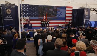 Presentation of colors by U.S Marines and singing of the U.S national anthem during the opening ceremony of the new U.S. Embassy in Jerusalem, Monday, May 14, 2018. Amid deadly clashes along the Israeli-Palestinian border, President Donald Trump’s top aides and supporters on Monday celebrated the opening of the new U.S. Embassy in Jerusalem as a campaign promised fulfilled. (AP Photo/Sebastian Scheiner)