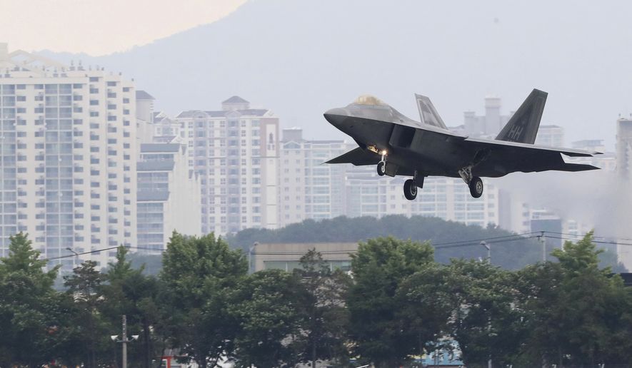 A U.S. F-22 Raptor stealth fighter jet lands as South Korea and the United States conduct the Max Thunder joint military exercise at an air base in Gwangju, South Korea, Wednesday, May 16, 2018. North Korea on Wednesday canceled a high-level meeting with South Korea and threatened to scrap a historic summit next month between President Donald Trump and North Korean leader Kim Jong Un over military exercises between Seoul and Washington that Pyongyang has long claimed are invasion rehearsals. (Park Chul-hog/Yonhap via AP)