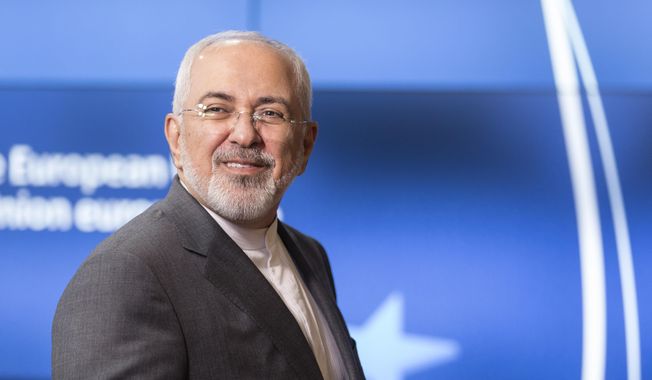 In this file photo, Iranian Foreign Minister Javad Zarif arrives prior to a meeting of the E-3 and Iran at the Europa building in Brussels on Tuesday, May 15, 2018. (Thierry Monasse, Pool Photo via AP) **FILE**