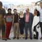 A person wearing a costume of the character Chewbacca, from left, actors Donald Glover, Alden Ehrenreich, Emilia Clarke, Woody Harrelson, Thandie Newton and Joonas Suotamo pose for photographers during a photo call for the film &#x27;Solo: A Star Wars Story&#x27; at the 71st international film festival, Cannes, southern France, Tuesday, May 15, 2018. (Photo by Vianney Le Caer/Invision/AP)