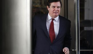 In this Nov. 6, 2017 photo, Paul Manafort, President Donald Trump&#39;s former campaign chairman, leaves the federal courthouse in Washington. A federal judge in Washington says special counsel Robert Mueller was working within his authority when he brought charges against President Donald Trump’s former campaign chairman.   (AP Photo/Jacquelyn Martin)