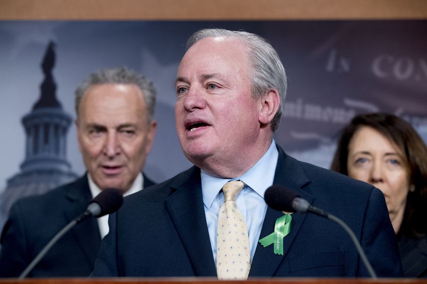Rep. Mike Doyle, D-Pa., center, accompanied by then-Senate Minority Leader Sen. Chuck Schumer of N.Y., left, and Sen. Maria Cantwell, D-Wash., right, speaks at a news conference on Capitol Hill in Washington, Wednesday, May 16, 2018, after the Senate passed a resolution to reverse the FCC decision to end net neutrality. (AP Photo/Andrew Harnik) ** FILE **