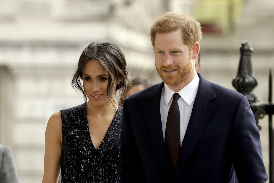 FILE - In this Monday, April 23, 2018 file photo, Britain's Prince Harry and his fiancee Meghan Markle arrive to attend a Memorial Service to commemorate the 25th anniversary of the murder of black teenager Stephen Lawrence at St Martin-in-the-Fields church in London. German royalists’ adrenaline has been surging as the Saturday, May 19 wedding of Prince Harry and his American bride-to-be Meghan Markle is creeping closer. There’s no way anybody here will be able to miss the event: Three German TV stations, ZDF, RTL and n-tv, will broadcast the event live and stream it on their websites too. Dozens of German correspondents are accredited and so-called “royal household experts” will explain the intricacies of the foreign ceremony. (AP Photo/Matt Dunham, file)