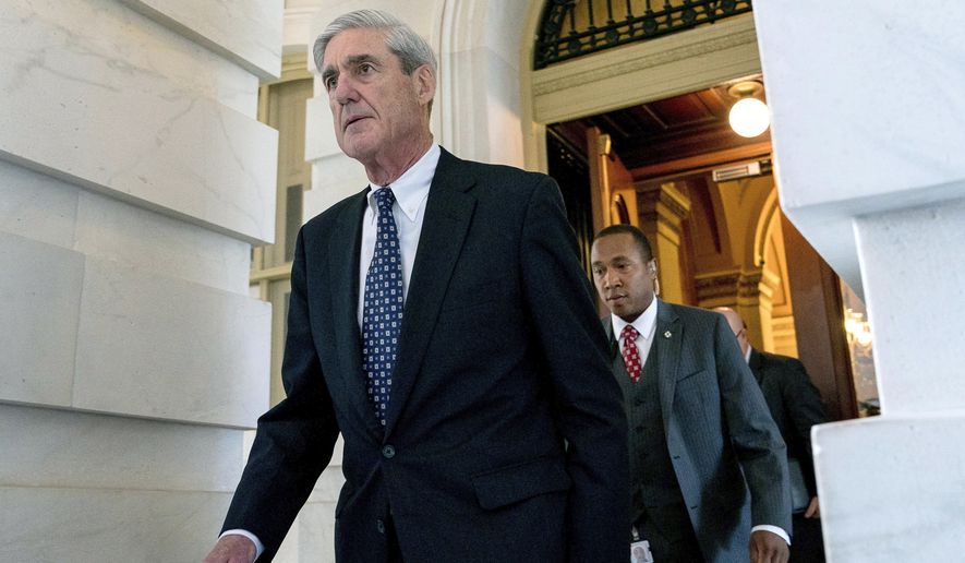 In this June 21, 2017, file photo, former FBI Director Robert Mueller, the special counsel probing Russian interference in the 2016 election, departs Capitol Hill following a closed door meeting in Washington. (AP Photo/Andrew Harnik, File)