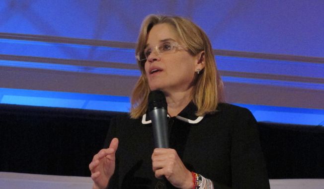 Carmen Yulin Cruz, the mayor of San Juan, Puerto Rico, speaks in Hartford, Conn. on Thursday, May 17, 2018, after receiving the &amp;quot;Latina Champion&amp;quot; award at the annual Latinas &amp;amp; Power Symposium, which promotes Hispanic professional women. (AP Photo/Pat Eaton-Robb) ** FILE **