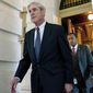 In this June 21, 2017, file photo, former FBI Director Robert Mueller, the special counsel probing Russian interference in the 2016 election, departs Capitol Hill following a closed door meeting in Washington. (AP Photo/Andrew Harnik, File)