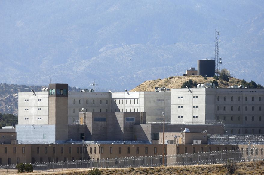 FILE - In this Oct. 15, 2015 file photo, Colorado State Penitentiary II, background, sits vacant inside a larger correctional complex, outside Canon City, in southern Colorado. Colorado lawmakers rejected an attempt to reopen it amid a push for broader criminal justice reforms. (AP Photo/Brennan Linsley, File)