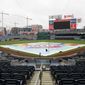 A tarp covers the infield at Nationals Park in Washington after it was announced that the baseball game between the Los Angeles Dodgers and the Washington Nationals had been postponed due to inclement weather, Friday, May 18, 2018. The game will be made up as part of a split doubleheader Saturday. (AP Photo/Pablo Martinez Monsivais)
