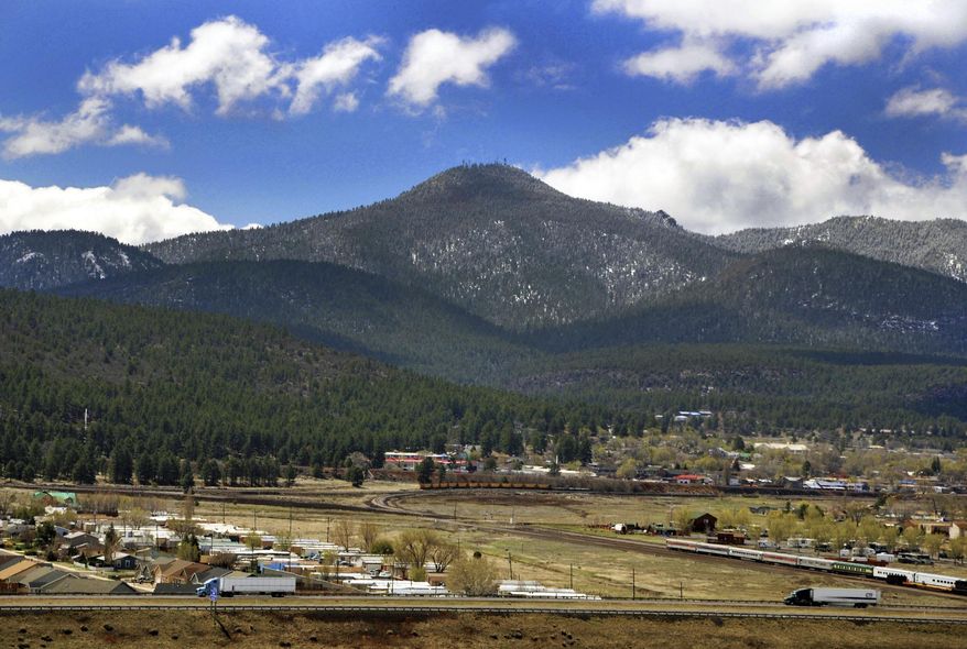 In this March 21, 2017, photo released by U.S. Forest Service, Southwestern Region, Kaibab National Forest with Bill Williams Mountain, background, in Williams, Ariz., is viewed. Apache-Sitgreaves National Forests announced Wednesday, May 16, 2018, that some parts will be closed to the public, although officials have not decided which ones. That is after the Kaibab National Forest on May 11, 2018, announced the temporary closure of about 15,000 acres centered on Bill Williams Mountain near Williams. The closure is intended to protect the watershed for Williams, a northern Arizona city that is a jumping-off point for many visitors to Grand Canyon National Park. (Dyan Bone/U.S. Forest Service via AP)