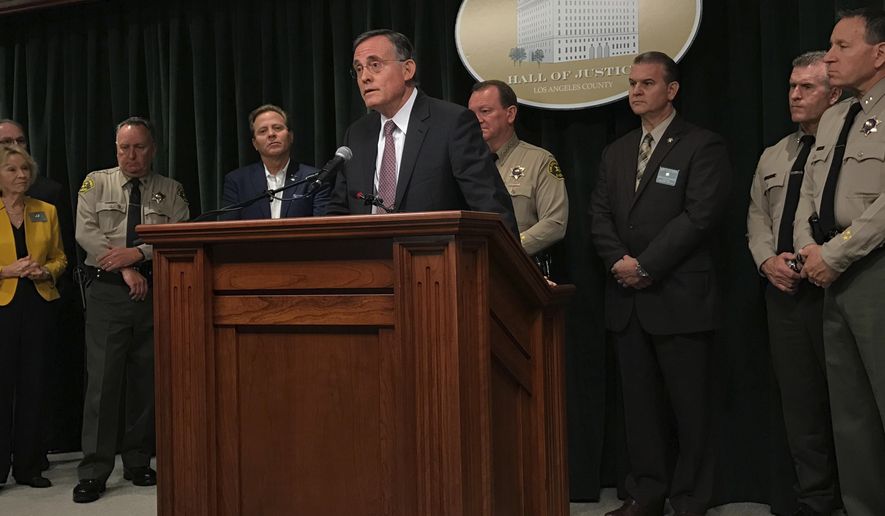 Fred Leeds, the stepson of victim Susan Leeds, speaks during a news conference with Los Angeles County Sheriff Jim McDonnell and other officials in Los Angeles on Friday, May 18, 2018. Sheriff's officials have made an arrest after Susan Leeds was fatally stabbed inside her car in the parking lot of a Southern California shopping mall. McDonnell said Friday that Cherie Townsend was arrested on suspicion of murder in connection with the May 3 stabbing. (AP Photo/Mike Balsamo)