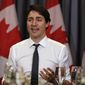 Prime Minister Justin Trudeau gestures during a roundtable discussion with members of the Canadian Technology Accelerator in Cambridge, Mass., Thursday, May 17, 2018. (AP Photo/Charles Krupa)