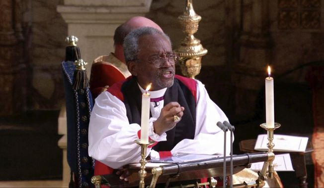 In this frame from video, the Most Rev. Michael Bruce Curry speaks during the wedding ceremony of Britain&#x27;s Prince Harry and Meghan Markle at St. George&#x27;s Chapel in Windsor Castle in Windsor, near London, England, Saturday, May 19, 2018. Rev. Curry, the presiding bishop of The Episcopal Church, said Friday that Russian President Vladimir Putin should stop his country’s invasion of Ukraine and “sit at the table of brotherhood” to resolve the conflict.  (UK Pool/Sky News via AP)