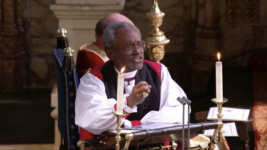 In this frame from video, the Most Rev. Michael Bruce Curry speaks during the wedding ceremony of Britain&#39;s Prince Harry and Meghan Markle at St. George&#39;s Chapel in Windsor Castle in Windsor, near London, England, Saturday, May 19, 2018.  (UK Pool/Sky News via AP)