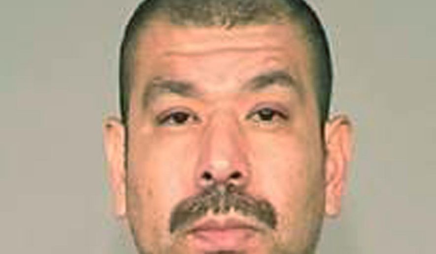 This Friday, May 18, 2018, booking photo released by the Fresno Police Department shows suspect Robert Gonzalez. Northern California police say they have arrested Gonzalez, 40, who allegedly violently abducted his former wife and her two young children. Fresno Police spokesman Mark Hudson says officers captured Gonzalez Friday and recovered his 2-year-old daughter. Gonzalez is accused of abducting her Thursday along with his ex-wife and her 11-month-old son who escaped earlier Friday. (Fresno Police Department via AP)