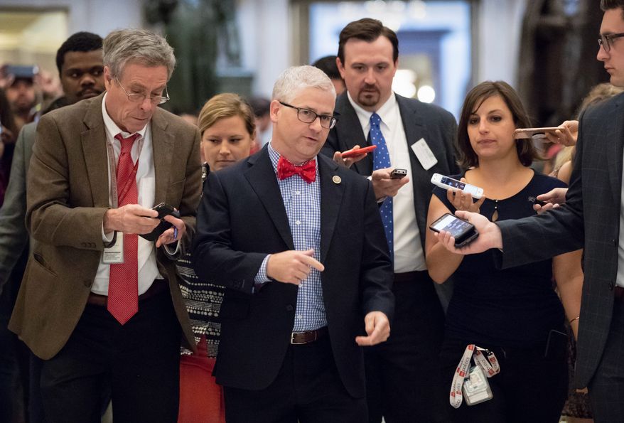House Chief Deputy Whip Rep. Patrick T. McHenry (center), North Carolina Republican, said the conservatives' move to link immigration language to the farm bill would backfire. (Associated Press/File)