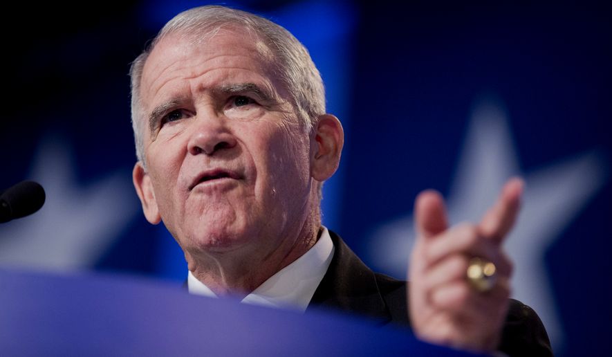 Retired Marine Lt. Col. Oliver North speaks at the 2014 Values Voter Summit in Washington, Friday, Sept. 26, 2014.  Prospective Republican presidential candidates are promoting religious liberty at home and abroad at a gathering of evangelical conservatives, rebuking an unpopular President Barack Obama while skirting divisive social issues that have tripped up the GOP.  (AP Photo/Manuel Balce Ceneta)