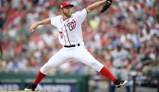 Washington Nationals starting pitcher Stephen Strasburg delivers during the third inning of a baseball game against the Los Angeles Dodgers, Sunday, May 20, 2018, in Washington. (AP Photo/Nick Wass)