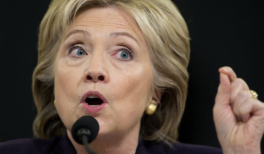 In this Oct. 22, 2015, file photo, then-Democratic presidential candidate, former Secretary of State Hillary Clinton testifies on Capitol Hill in Washington, before the House Benghazi Committee. (AP Photo/Carolyn Kaster, File)