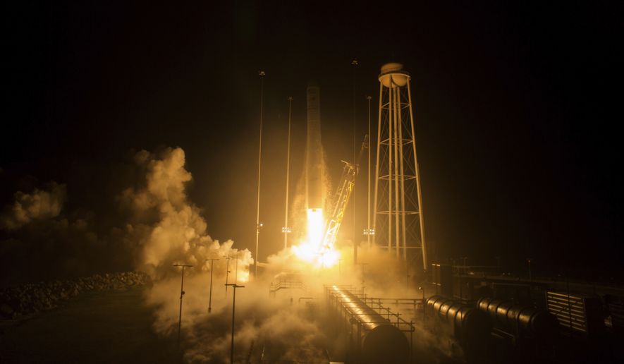 The Orbital ATK Antares rocket, with the Cygnus spacecraft onboard launches Monday, May 21, 2018, at NASA&#39;s Wallops Flight Facility in Virginia. The Orbital ATK launched a fresh load of supplies to the International Space Station. (Aubrey Gemignani/NASA via AP)