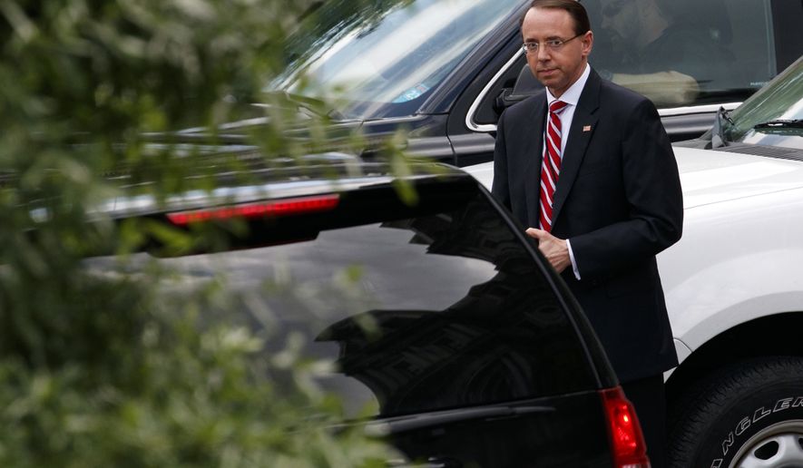 Deputy Attorney General Rod Rosenstein leaves a meeting at the White House, Monday, May 21, 2018, in Washington. (AP Photo/Evan Vucci)