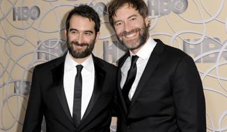 FILE - In this Jan. 8, 2017 file photo, Indie filmmakers Jay Duplass, left, and Mark Duplass arrive at the HBO Golden Globes afterparty in Beverly Hills, Calif. The brothers have written a memoir called “Like Brothers.” It mixes autobiography, movie-making advice, observational comedy, old scripts and emails, and tips on keeping friendships in business. (Photo by Richard Shotwell/Invision/AP, File)